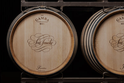 Oak barrels with the Sea Smoke logo on them